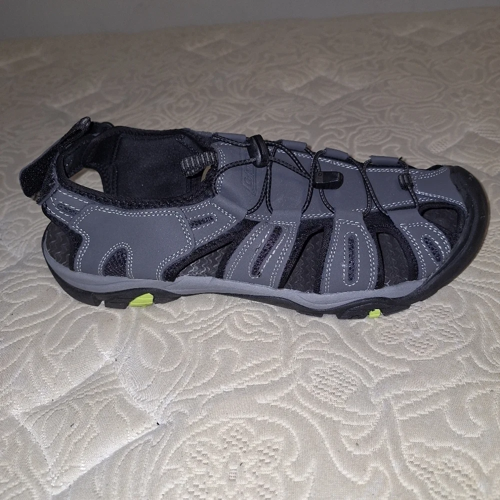 A pair of Coleman George sandals in a men's size 13M. They're in excellent shape